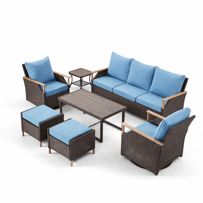 Outdoor furniture set with blue cushions on a white background