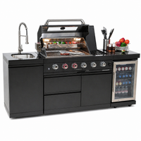 Black outdoor kitchen island with grill, sink, and refrigerator on a white background
